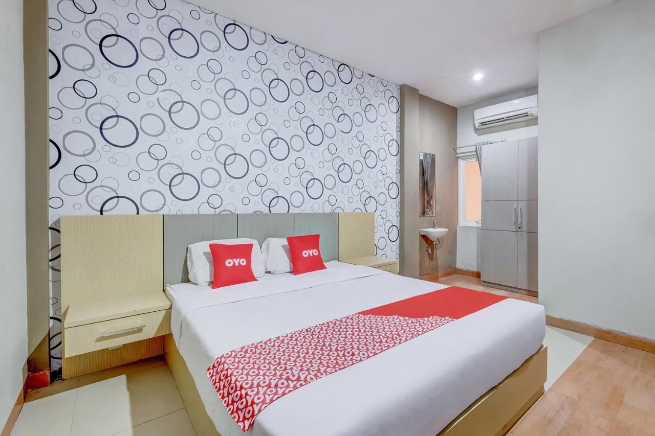 Oyo Flagship 3726 Tembok Batu Residence Tugu Esterno foto
