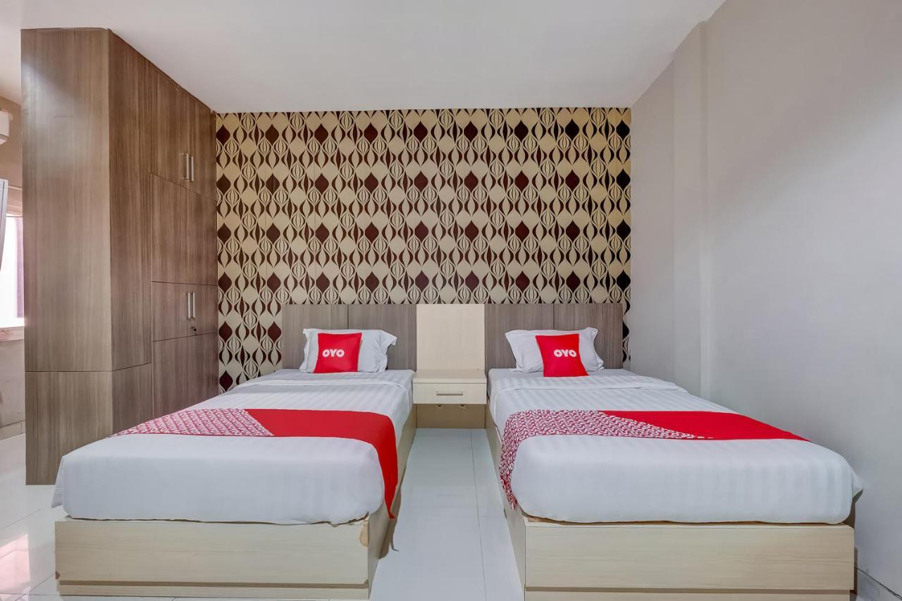 Oyo Flagship 3726 Tembok Batu Residence Tugu Esterno foto