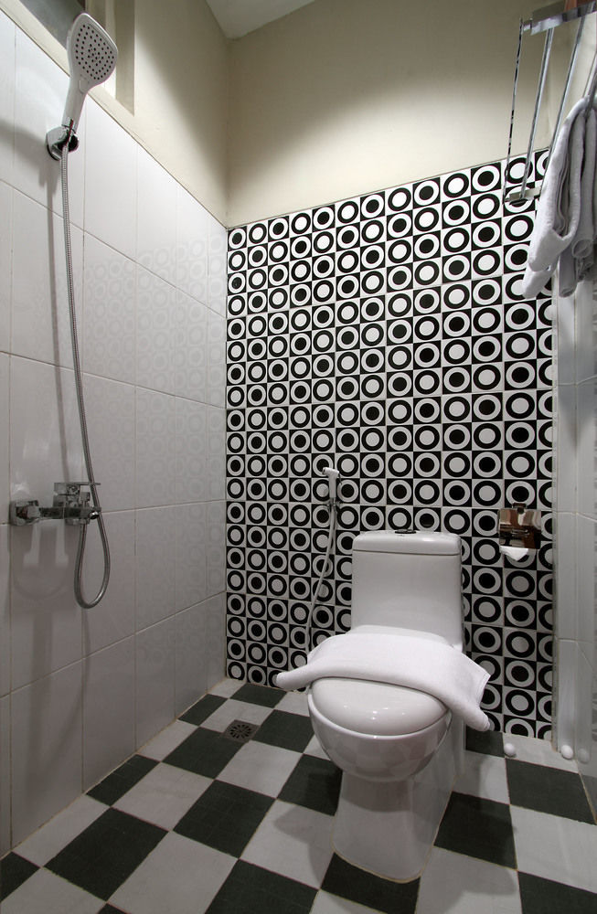 Oyo Flagship 3726 Tembok Batu Residence Tugu Esterno foto